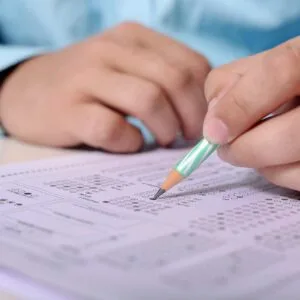 man, men, hand, person, people, male, portrait, human, adult, business, young, fill, sheet, paper, pencil, work, office, educate, exam, circle, filed, picture, desk, table, exam, exam, exam, exam, exam
